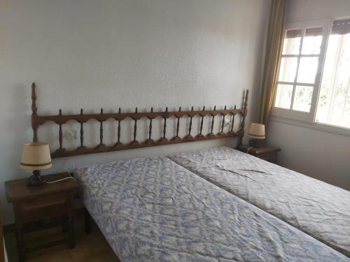 Postel nebo postele na pokoji v ubytování APARTAMENT AMB GRAN TERRASSA