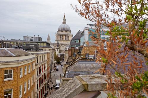 a view of the capitol building from the roofs of buildings at Cheval Calico House in London