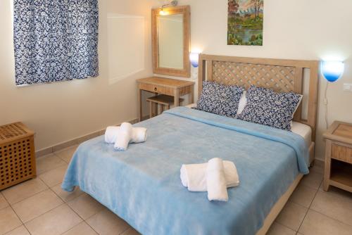 Ένα ή περισσότερα κρεβάτια σε δωμάτιο στο Modi Resort