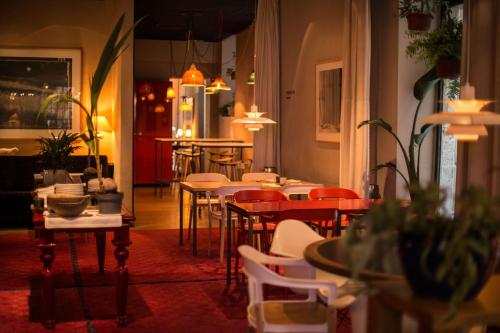 Restaurant o un lloc per menjar a Hotel Neri – Relais & Chateaux