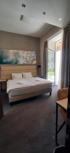 Voodi või voodid majutusasutuse Inter Hotel toas