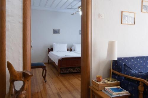 Postel nebo postele na pokoji v ubytování Kavala Rooms