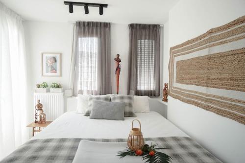 Posteľ alebo postele v izbe v ubytovaní Urban Beach Studio