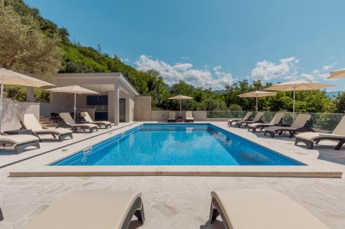 Πισίνα στο ή κοντά στο Djukanovic Apartments