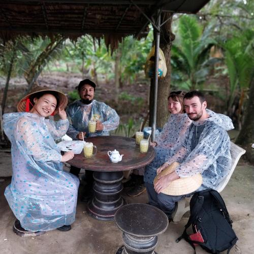 a group of people sitting around a table at BenTrestay in Giồng Tú Ðiền