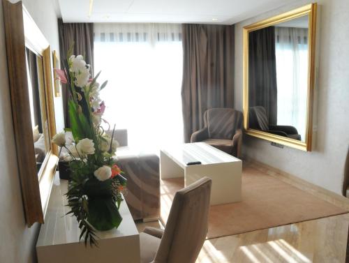 Un lugar para sentarse en Suite Hotel Casa Diamond