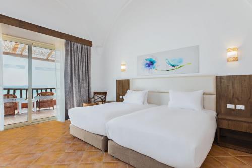 Pickalbatros Villaggio Aqua Park - Portofino Marsa Alam — Bedroom