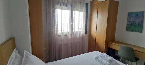 Katil atau katil-katil dalam bilik di Toumba apartments