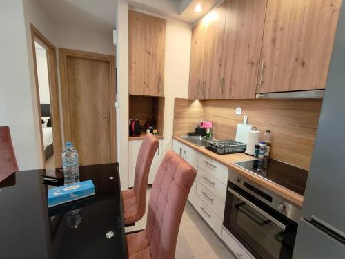 Η κουζίνα ή μικρή κουζίνα στο Chic Apartment near Acropolis