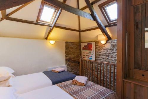 a bedroom with two beds in a room at South Priddacombe - Bolventor Cornwall in Launceston