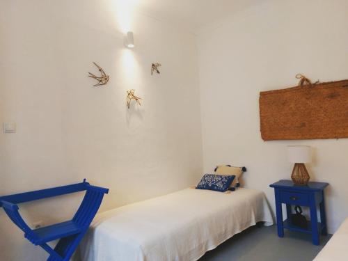 Ένα ή περισσότερα κρεβάτια σε δωμάτιο στο Moradia com Piscina Casa Mourisca Alqueva