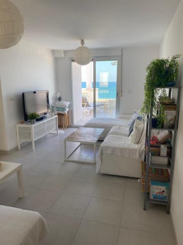 Posteľ alebo postele v izbe v ubytovaní Apartamento Primera Línea de playa