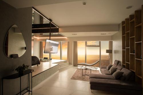 Гостиная зона в In The Sky - Apartamenty w Sky Tower
