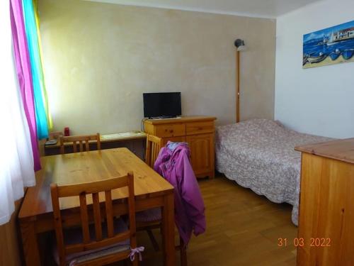 Postel nebo postele na pokoji v ubytování Un séjour les pieds dans l'eau