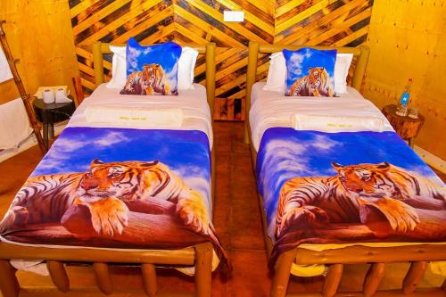 Ένα ή περισσότερα κρεβάτια σε δωμάτιο στο Little Amanya Camp