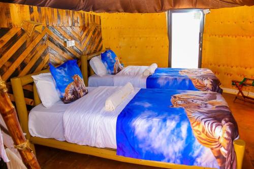 Ένα ή περισσότερα κρεβάτια σε δωμάτιο στο Little Amanya Camp