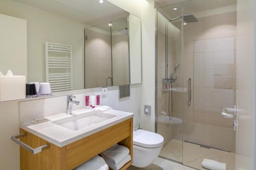 Ein Badezimmer in der Unterkunft Hôtel de Cavoye