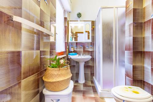 Et badeværelse på Appartamento Turchese - MyHo Casa