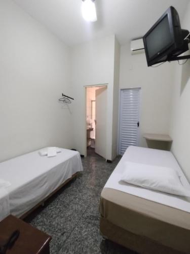 Postel nebo postele na pokoji v ubytování BIGS HOTEL
