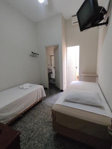 Postel nebo postele na pokoji v ubytování BIGS HOTEL