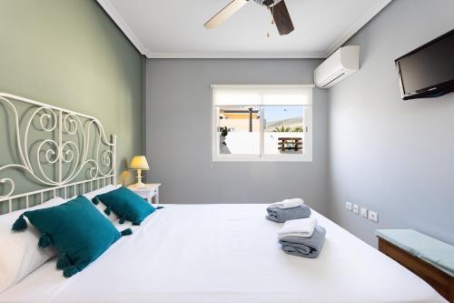 Posteľ alebo postele v izbe v ubytovaní Home2Book Comfy Apt Puertito de Güímar, Pool