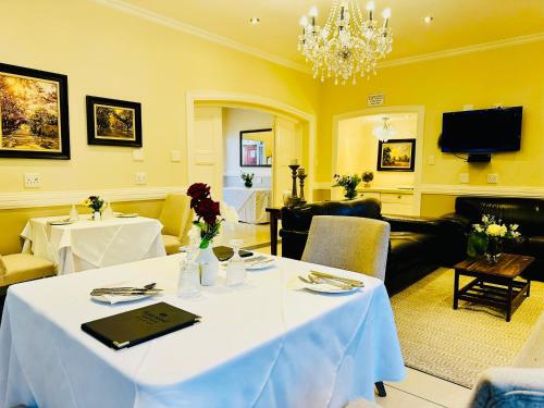 TV o dispositivi per l'intrattenimento presso Waterkloof Guest House