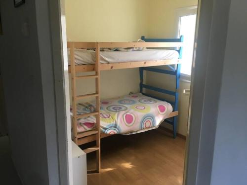 Ένα ή περισσότερα κρεβάτια σε δωμάτιο στο Maison La chambrette