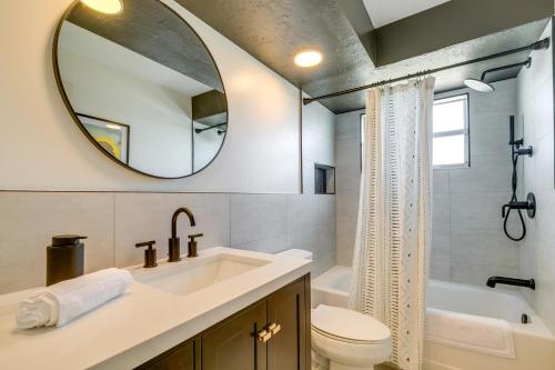 a bathroom with a sink and a toilet and a mirror at Florida Vacation Rental with Enclosed Porch! in Beverly Hills