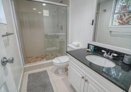 a bathroom with a shower and a toilet and a sink at Miami Hollywood 2 Bedroom 2 Bath Condo 002-22bmar in Hollywood