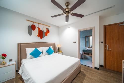 Roma Hotel Phu Quoc - Free Airport Shuttle & Sunset Town Tourにあるベッド