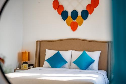 Roma Hotel Phu Quoc - Free Airport Shuttle & Sunset Town Tourにあるベッド