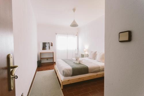 Postel nebo postele na pokoji v ubytování Best Houses 75 - Aurora Apartment
