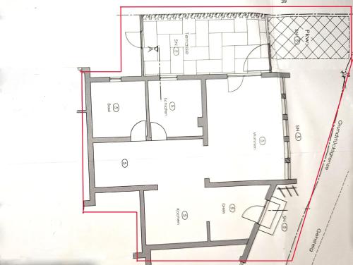 a floor plan of a house at Ferienhaus Strandbadallee in Waging am See