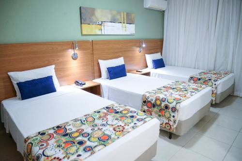 Postel nebo postele na pokoji v ubytování Comfort Hotel Bauru