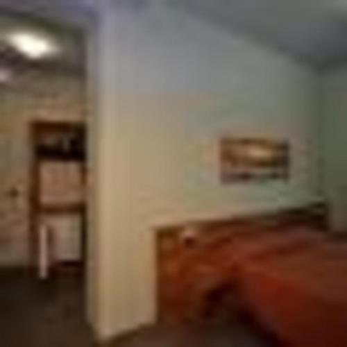 a blurry photo of a room with a white wall at Residence Paradiso Monolocale 206 in Moneglia