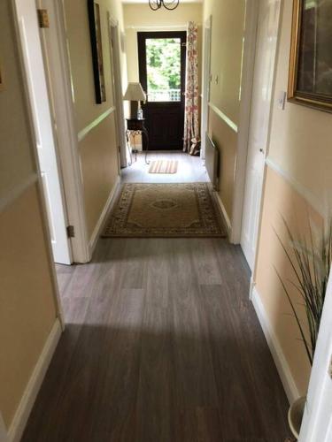 a hallway of a home with a hallwayngth at Meadow House in County Donegal in Donegal