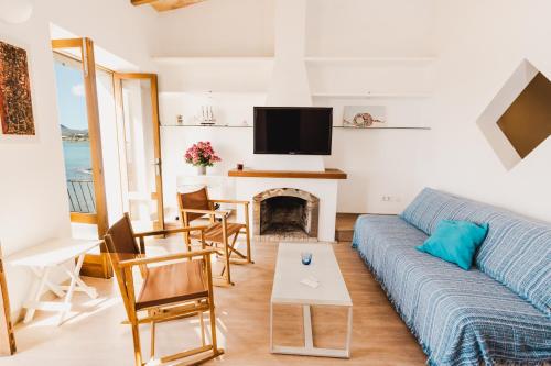 TV a/nebo společenská místnost v ubytování Sa Punta Dúplex Cala Ratjada