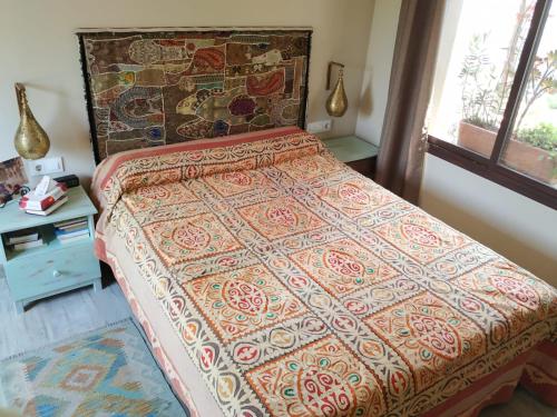 En eller flere senge i et værelse på Casa rural verde