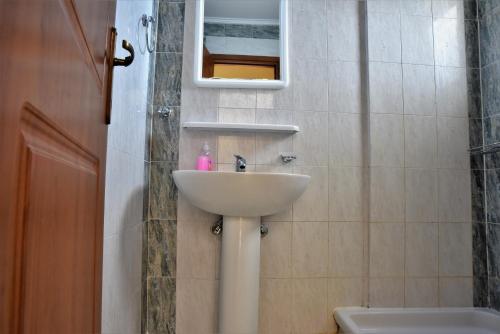 Koupelna v ubytování Elpida Hotel