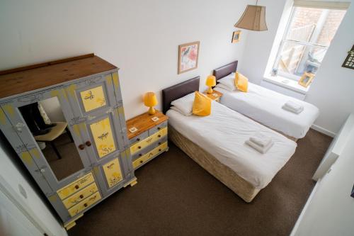 Llit o llits en una habitació de The Torrs Apartments New Mills