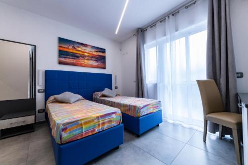 BNB Aria di Mareにあるベッド