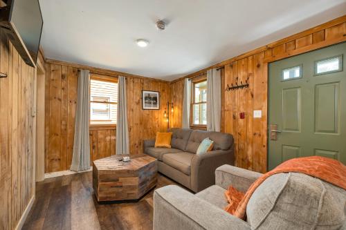 a living room with a couch and a table at The Inn & More in Bartlett