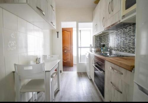 Kuchyň nebo kuchyňský kout v ubytování Vivienda con Fines Turísticos Salvador