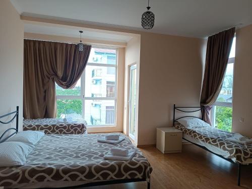 Ένα ή περισσότερα κρεβάτια σε δωμάτιο στο Lika Hotel