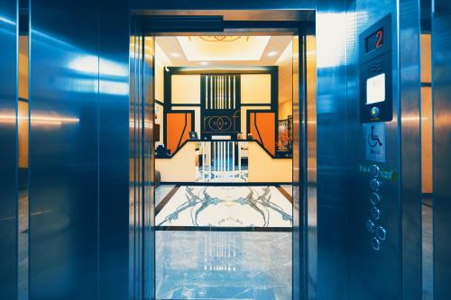 a view of a hallway through a glass door at Roof 264 Hotel & Suites in Sakarya