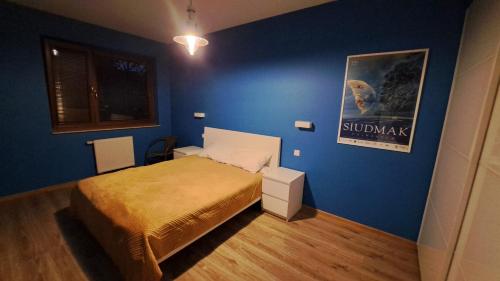 Tempat tidur dalam kamar di Apartament Marzenie 15 - Opole
