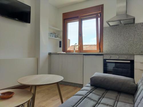 Η κουζίνα ή μικρή κουζίνα στο Arzúa Centro Vivienda de uso turístico