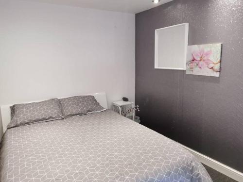 Una cama o camas en una habitación de Wimpole Lounge