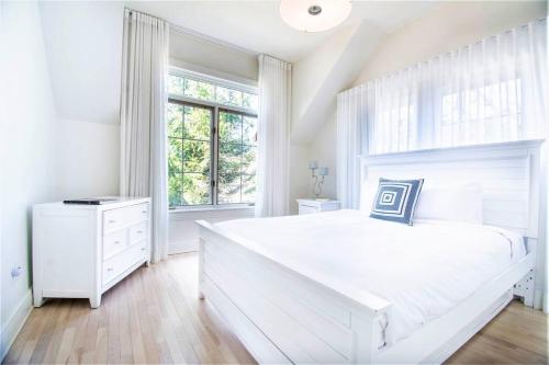 Postel nebo postele na pokoji v ubytování Tremblant Prestige - Panache 632