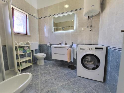 Koupelna v ubytování Cozy Apartment Mandula